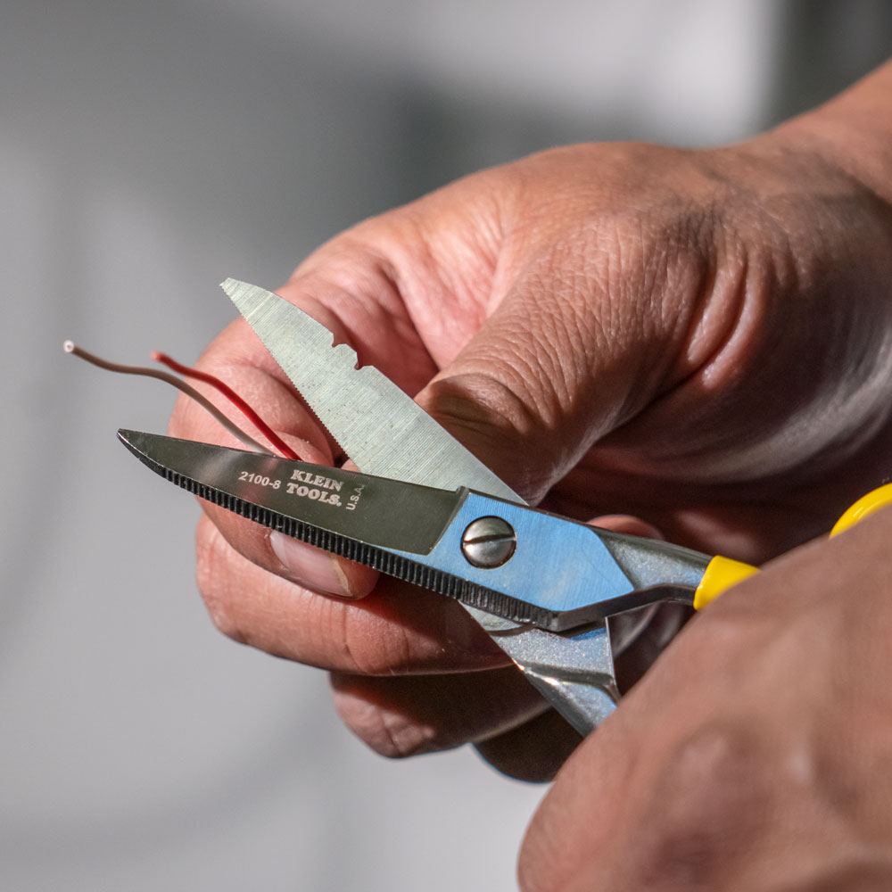 Scissors cutting wires