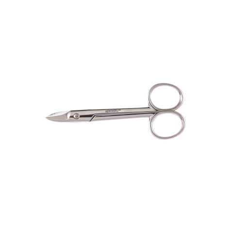 A pair of angled bandage scissors made of polished metal, featuring two round finger rings and a blunt lower tip designed to slide safely under dressings. The word ‘HERITAGE’ is engraved along the side of the upper blade.