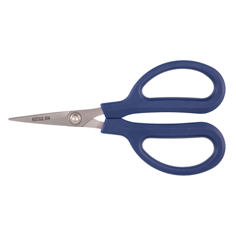Stainless steel scissors with pointed blades and blue plastic handles, shown horizontally with the blades facing left. The upper blade is stamped with the text ‘HERITAGE #544'.